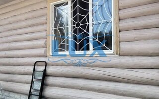 сварная оконная решетка для бревенчатого дома